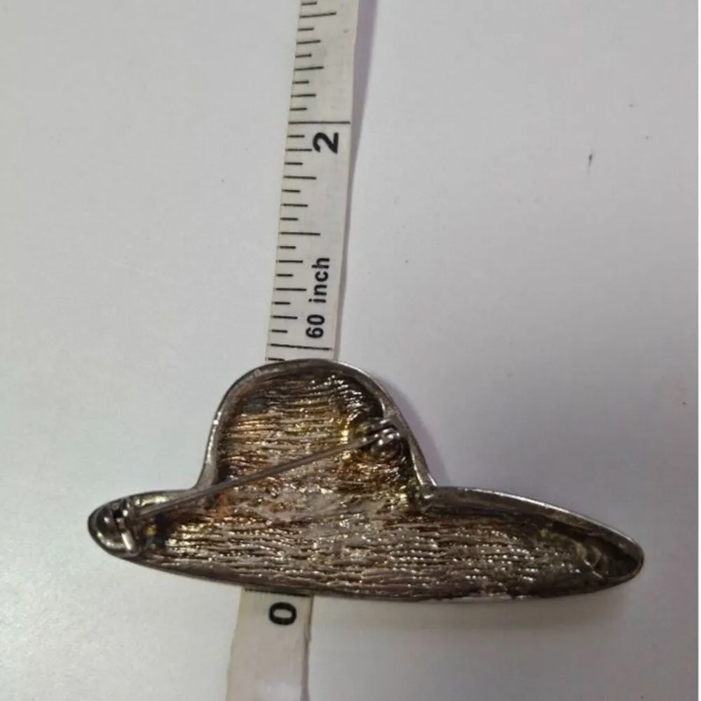 Gold tone red hat society brooch